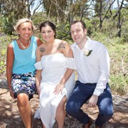 Celebrant Sue poses with happy newlyweds Tenisha and Leith